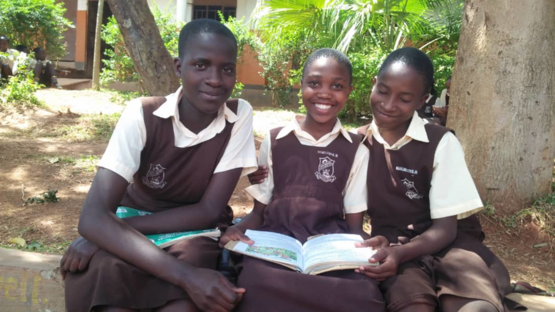 Primary Six girls reading story books